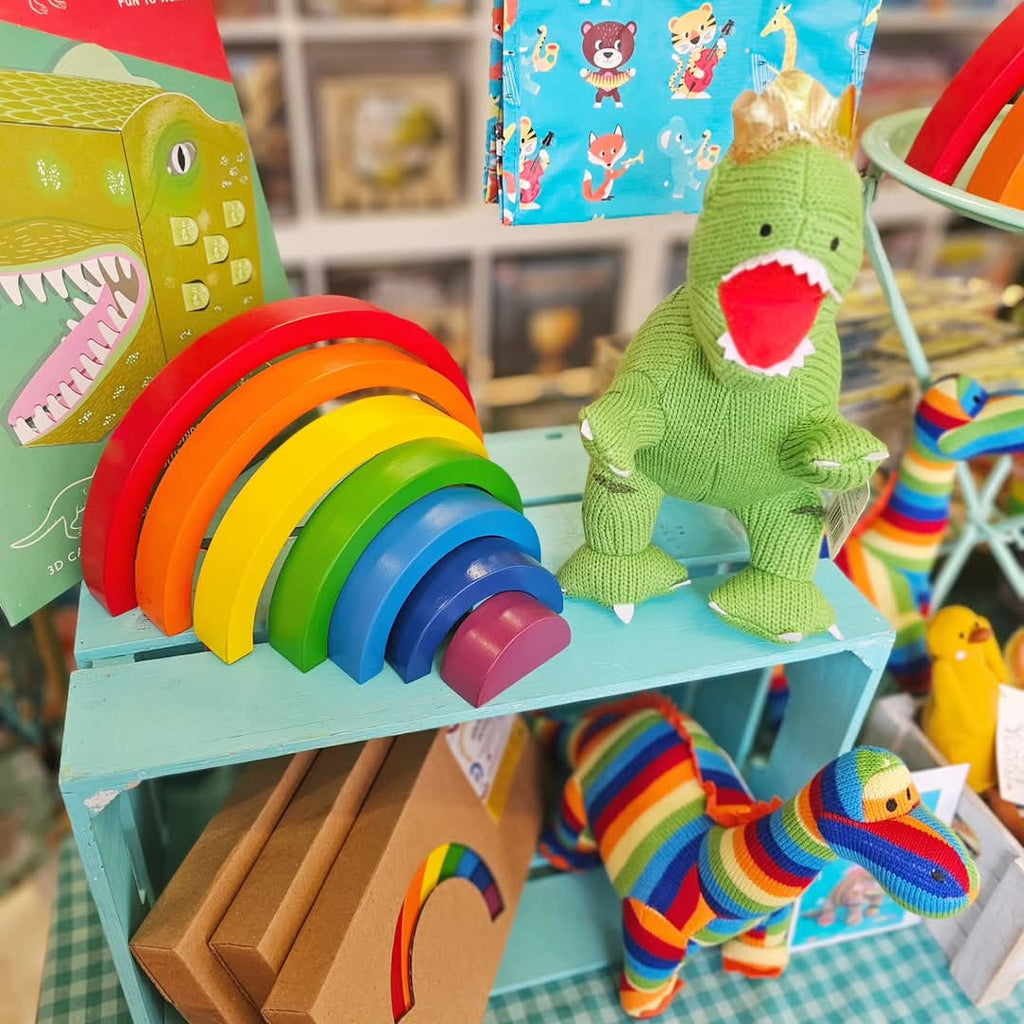 colourful-table-with-best-years-green-t-rex-dino-with-crown-and-rainbow-wooden-stacker-toy