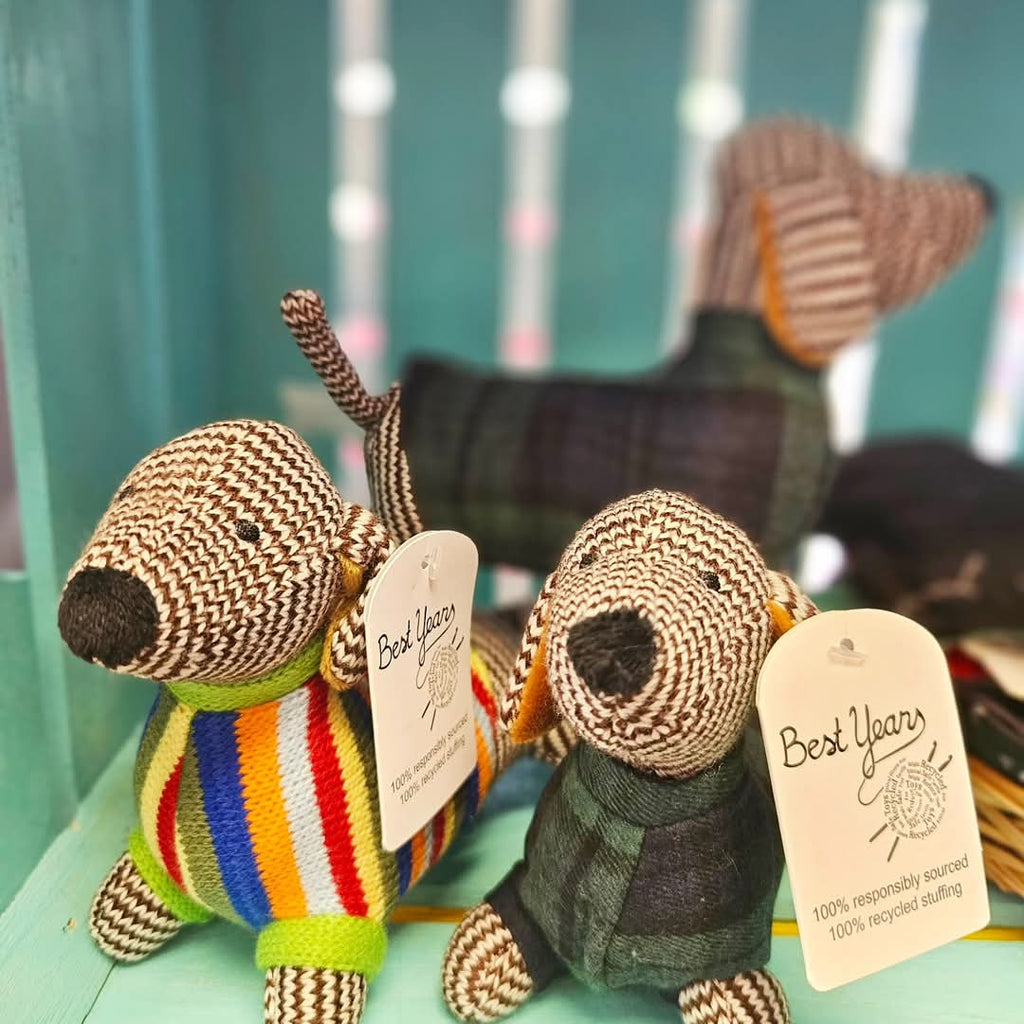 knitted sausage dogs with jumpers bright and tartan