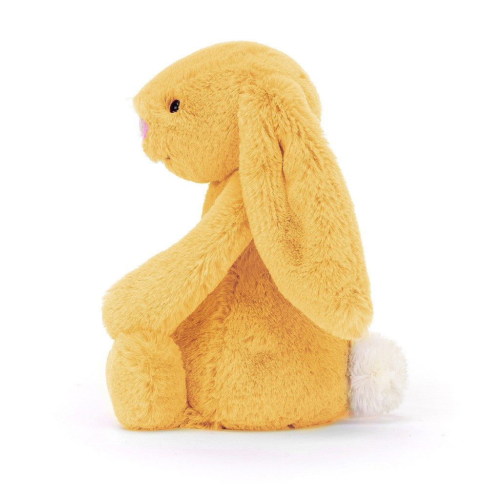 This super soft Jellycat Bashful Sunshine Bunny has citrus orange fur, a pastel-pink nose and the cutest white bob tail! BASS6BSU. Sold by Say It Baby Gifts - side view