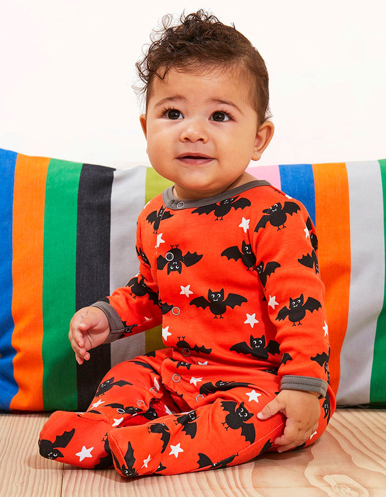 This fabulous Toby Tiger Organic Bat Print Sleepsuit is bright orange in colour with cute black bats and contrasting grey trim. It also glows in the dark! Sold by Say It Baby Gifts