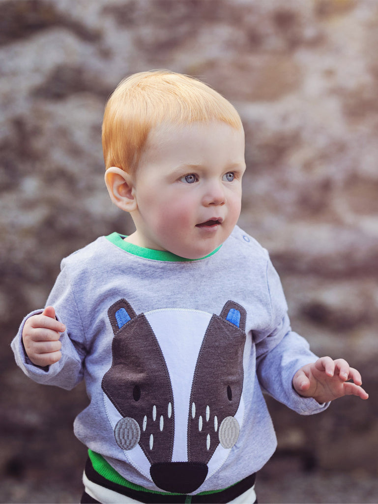 Blade & Rose Pip The Badger Top - bold, bright and fun! This gorgeous muted colours top features the sweet Pip The Badger with greys, whites and a little dash of royal blue, with a jersey applique and embroidery detail. Sold by Say It Baby Gifts