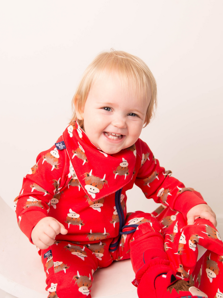 Blade & Rose Highland Cow Zip Up Romper - bold, bright and fun! This fab romper is bright red with contrasting navy zip and the cutest Highland Cow print design.