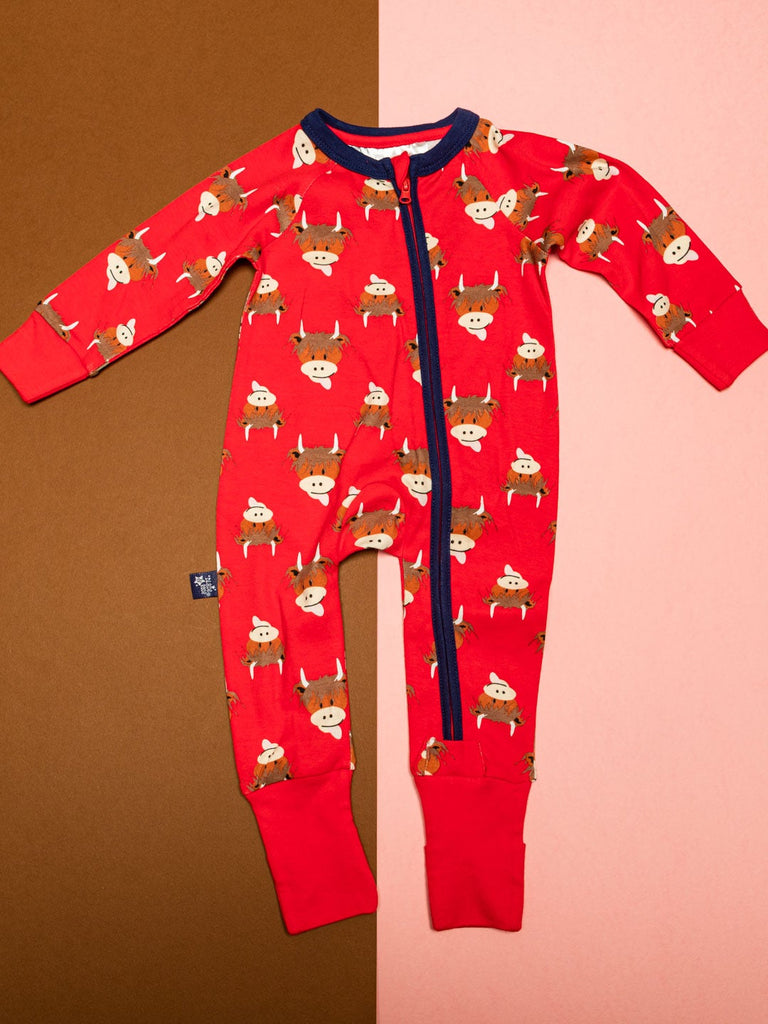 Blade & Rose Highland Cow Zip Up Romper - bold, bright and fun! This fab romper is bright red with contrasting navy zip and the cutest Highland Cow print design.