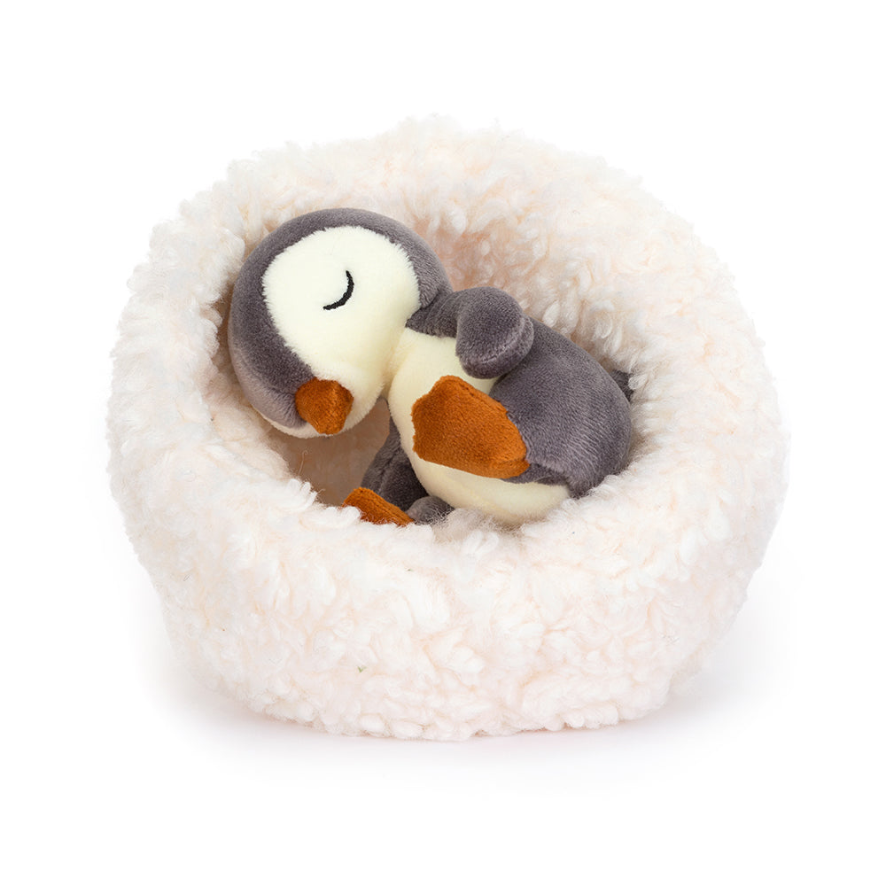 Jellycat Hibernating Penguin. Penguins don't normally sleep in the winter, but Hibernating Penguin does things his own way! Sold by Say It Baby Gifts