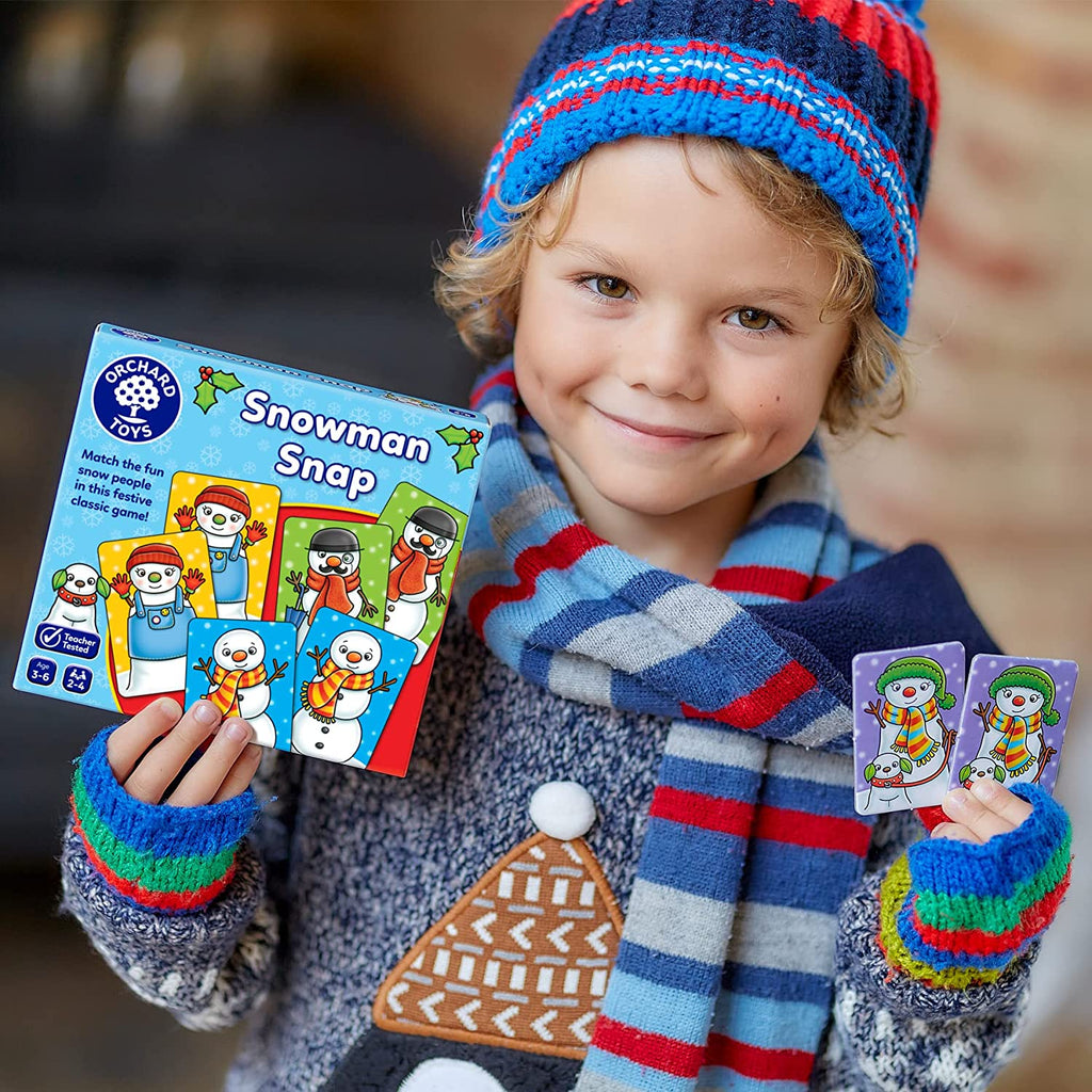 Snowman Snap by Orchard Toys -  A classic snap game with a festive twist! Sold by Say it Baby Gifts